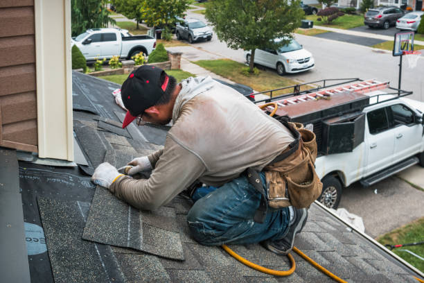 Professional Storm Damage Roof Repair technician working in Carteret, NJ